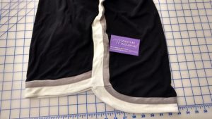 La cliente aimait la robe à l’exception de la partie plus longue à l'arrière. J'ai raccourci la partie arrière en gardant le même style.